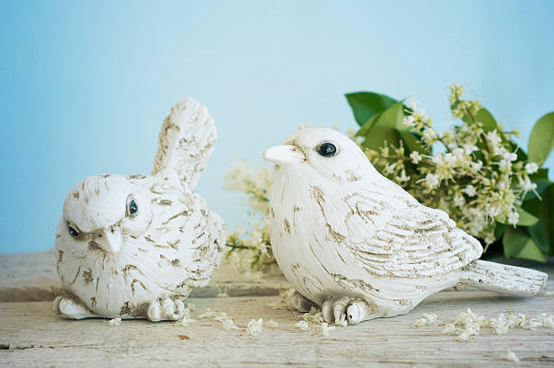 istock Bird with spring blossom branch 521870127