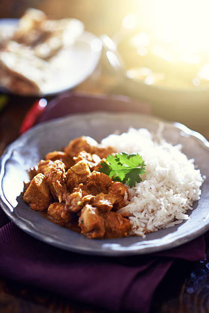 istock indian butter chicken curry with basmati rice 521870961