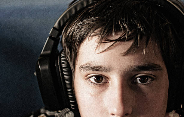 istock boy and headphones 521871789