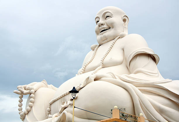 istock Happy Buddha with beads in Vietnam 521872511