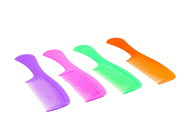 istock Purple comb isolated on white close up look 521873233
