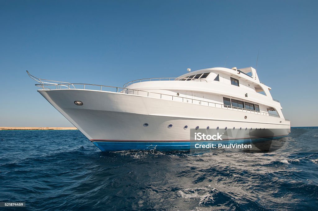 Luxury motor yacht at sea Large luxury motor yacht on a tropical sea Yacht Stock Photo