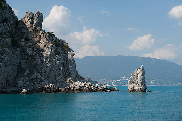 istock Rock in the sea 521874689