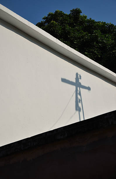 istock shadow of a cross right 521874913