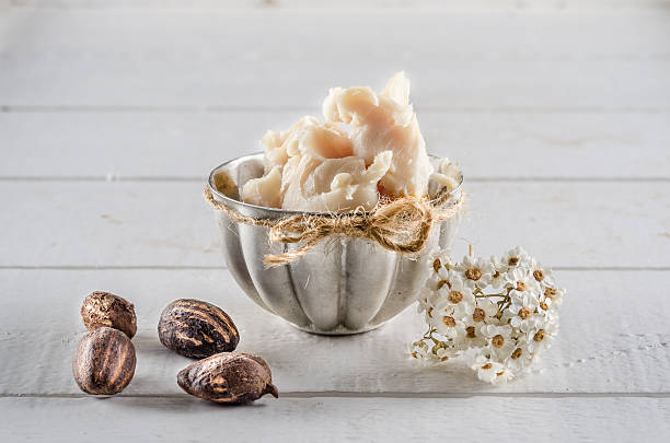 Shea butter and nuts stock photo