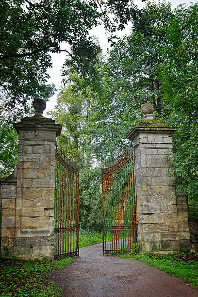 istock Old gate in the palace park of Gatchina 521877153