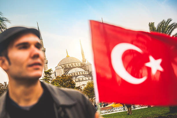 istock Young man during a demostration in Istanbul 521890043
