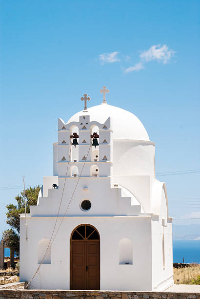istock Belfry at blue sky on Sifnos island, Greece 521891179
