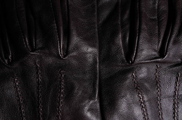 istock Brown leather gloves detail 521891413