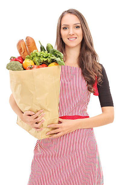 istock Young housewife holding a grocery bag 521892491