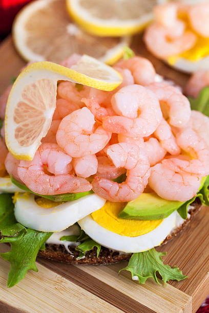 istock Fresh sandwich with shrimp and egg 521893999