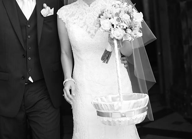 istock Newlywed couple holding hands. 521908029