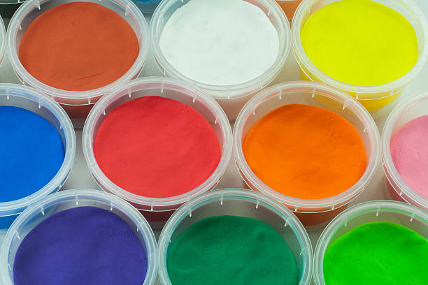 istock clay or plasticine in cup colorful background 521908135