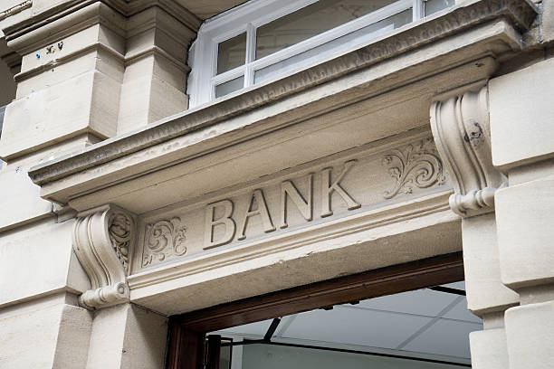 istock Bank Sign logo entrance, Stone Background 521910147