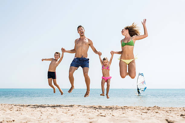istock Family having fun at the beach. 521910473