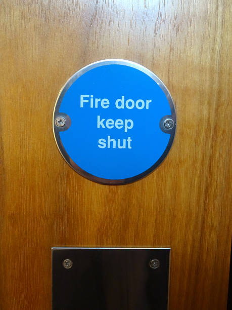 istock Image of circular blue Fire Door Keep Shut safety sign 521911263