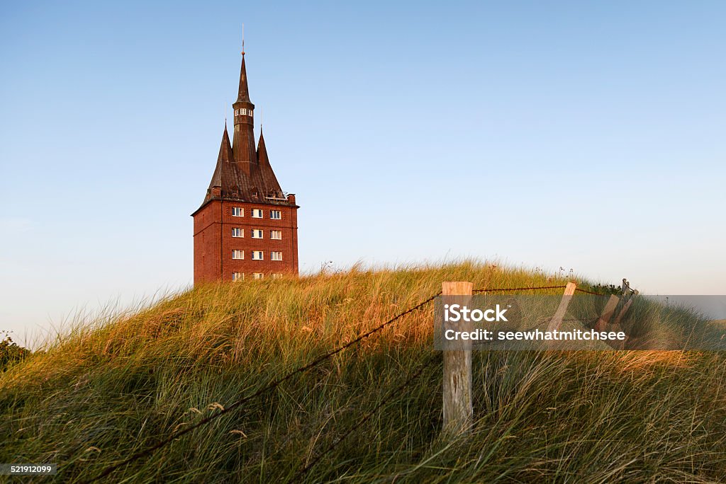 The West Tower The west tower of the island of Wangerooge at sunset, Germany. Wangerooge Stock Photo