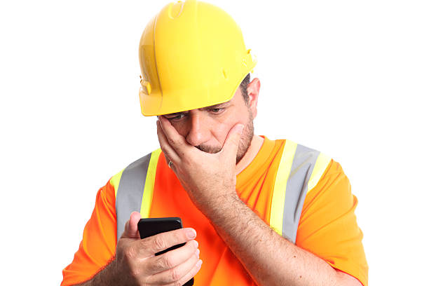 istock Construction Worker Receives Bad News 521913625