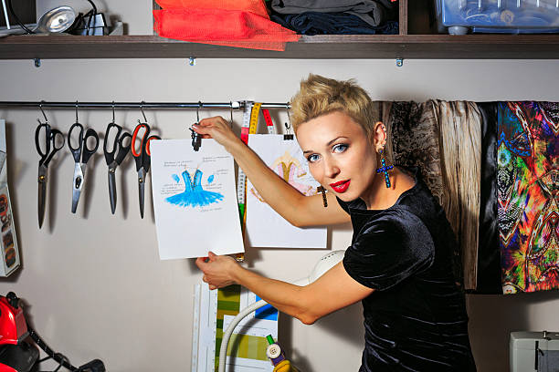 istock Fashion designer working with dummy 521929231