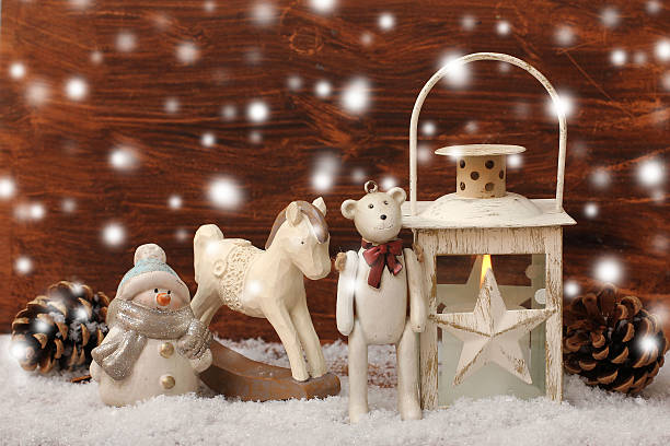 istock rocking horse,teddy bear and lantern on christmas background 521929487