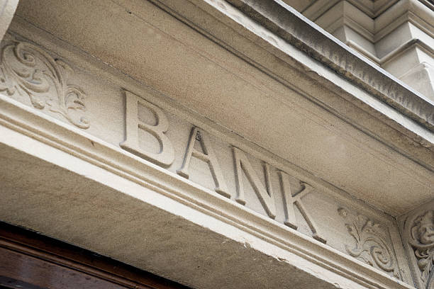 istock Bank Sign logo entrance, Stone Background 521929583