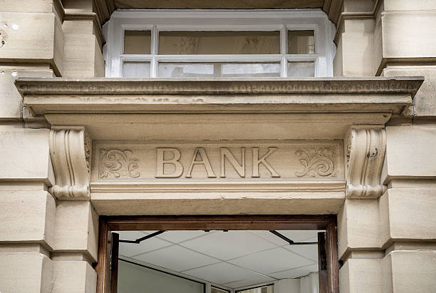 istock Bank Sign logo entrance, Stone Background 521930205