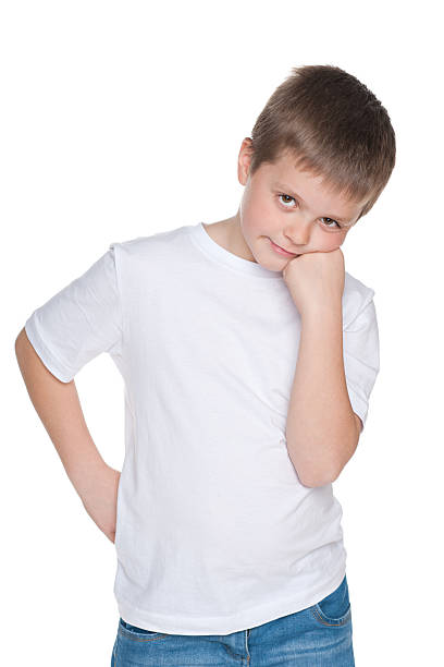 istock Thoughtful boy in a white shirt 521930839