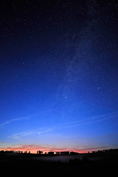 istock Dawn on a starry background sky and the Milky Way. 521934945