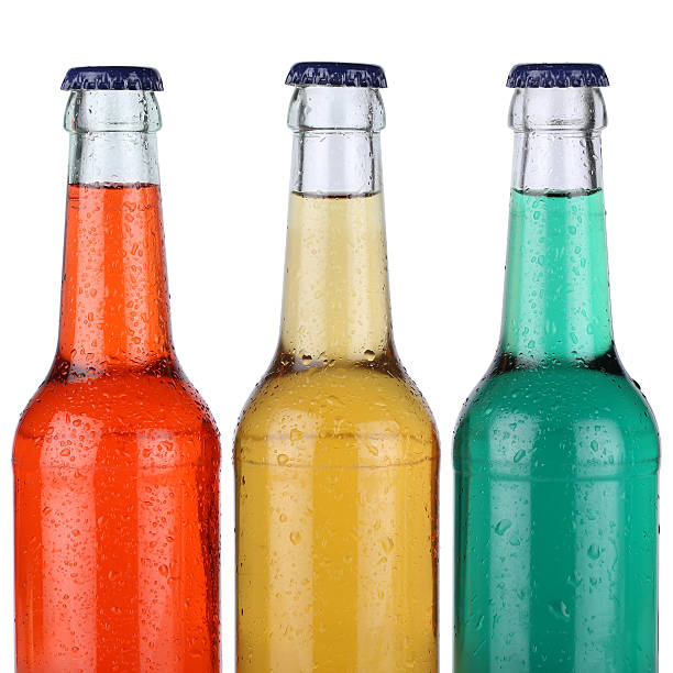istock Colorful soft drinks or lemonade in bottles isolated 521935525