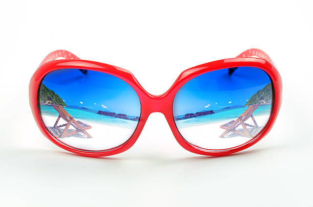 istock red sunglasses with reflection of a beautiful  sea scape 521951911