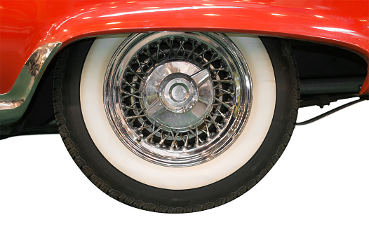 Close Up of Whitewall Tire of Red Classic Car on White Background