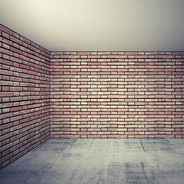 istock Empty room interior with red brick walls and concrete floor 521954349