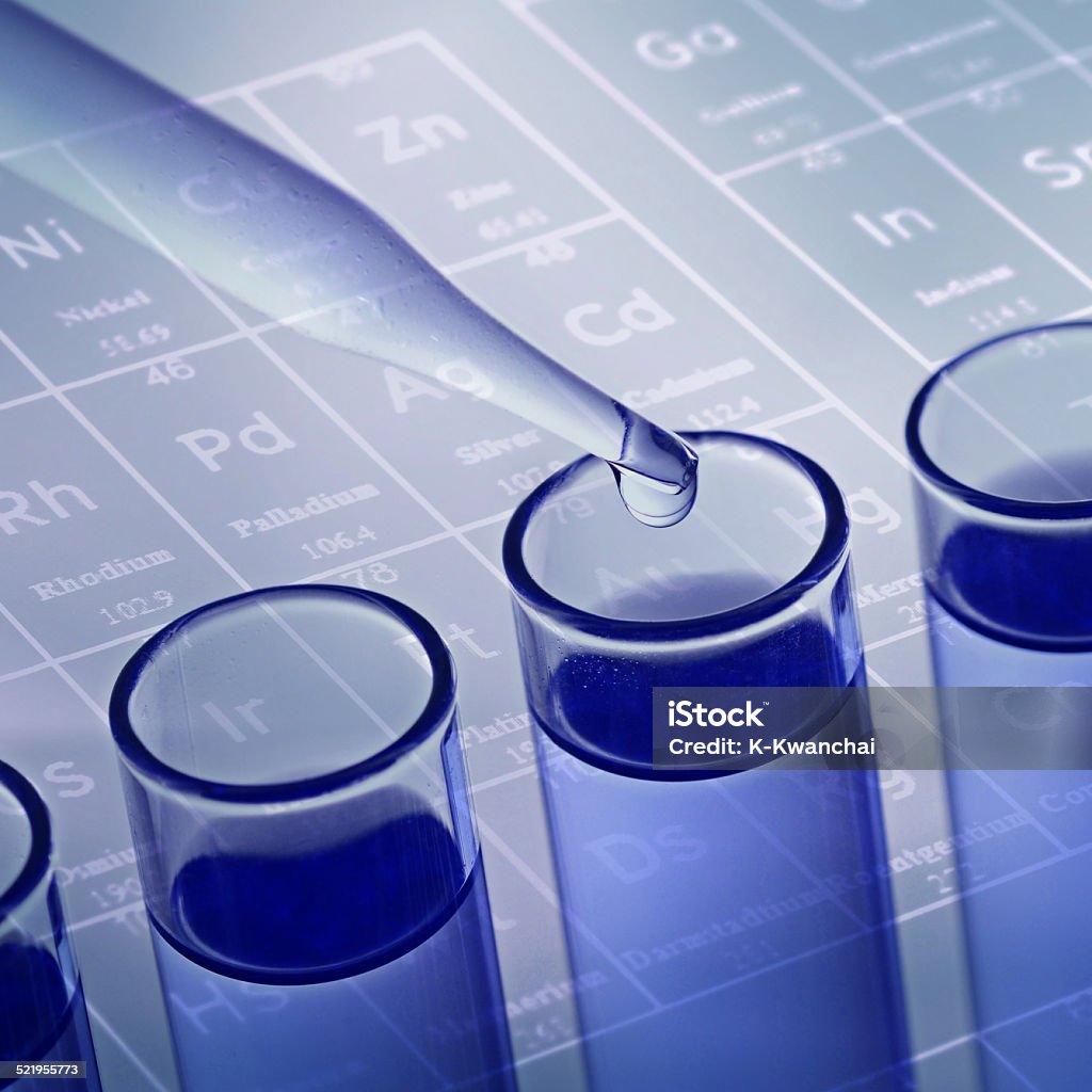 science laboratory test tubes with periodic table background Biochemistry Stock Photo