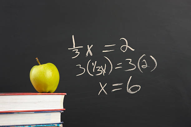istock Green apple and algebra equation. 521957131