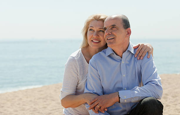 istock Elderly couple at sea shore 521957313