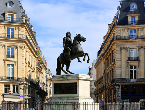 Statue of Louis XIV in the center of the Place des Victoires in Paris, France