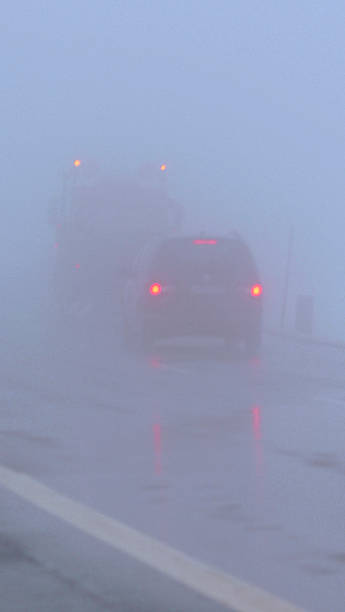 istock car ride in the fog 521971089