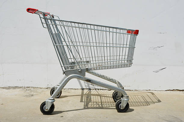 istock Empty shopping cart on white background 521971169