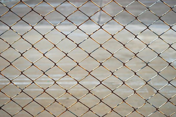 istock old rusty steel wire fence 521975121