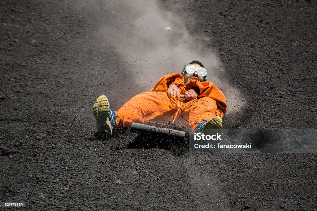 Volcano boarding A guy is doing volcano boarding in the Cerro Negro of Nicaragua Volcano Stock Photo