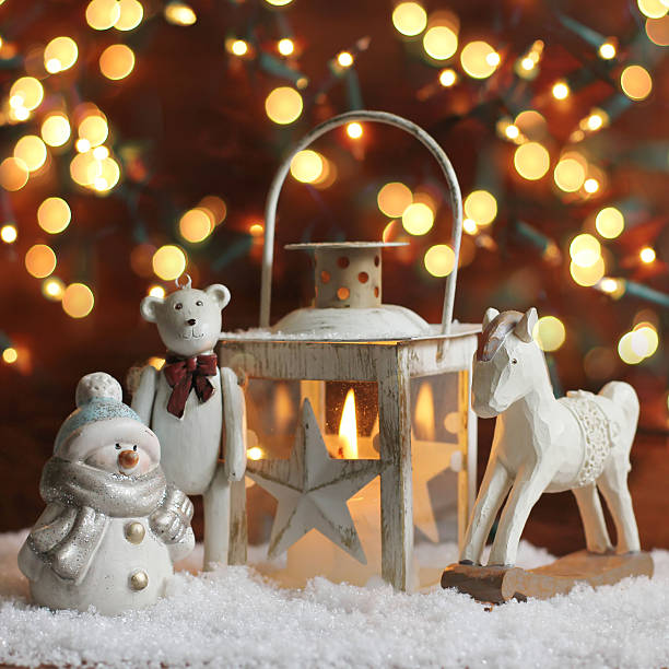 istock rocking horse,teddy bear and lantern on christmas background 521976123