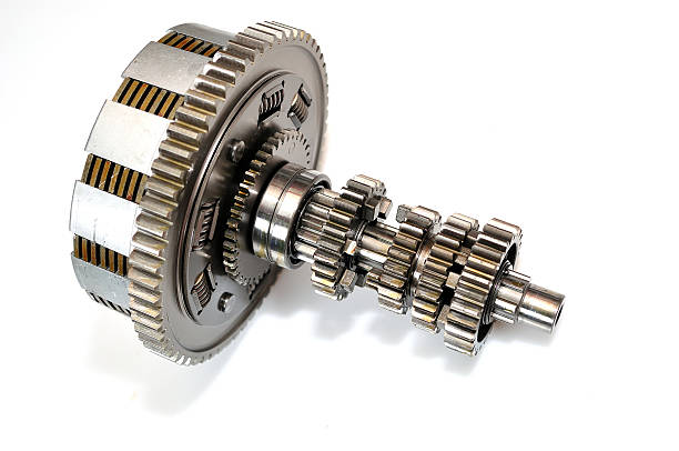 Motorcycle clutch with gears. Motorcycle clutch gears isolated on white background. coupling stock pictures, royalty-free photos & images