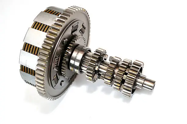 Motorcycle clutch gears isolated on white background.