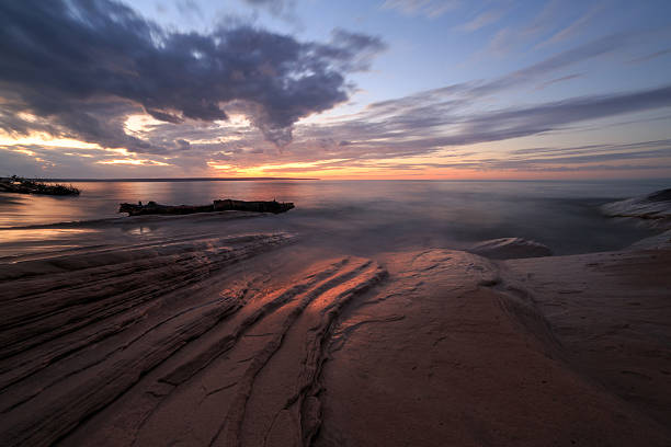 istock Sunset over Lake Superior at Pictured Rocks, Michigan 521977170