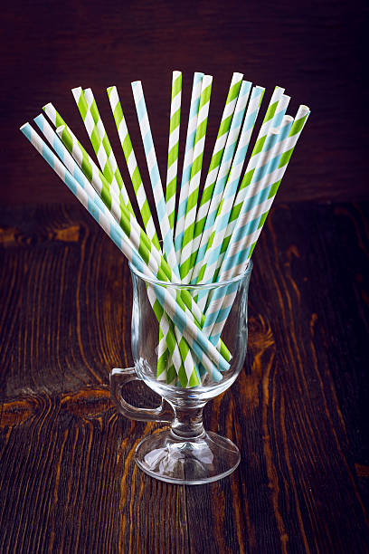 istock Striped straws for cocktails in a glass 521977270