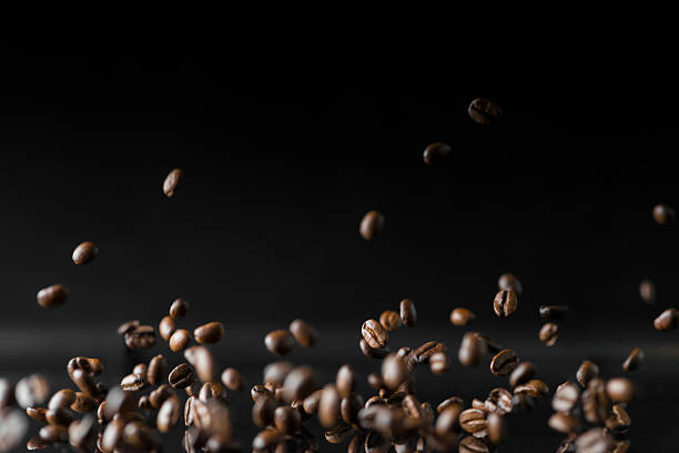 istock lot of roasted coffee beans flying 521977496