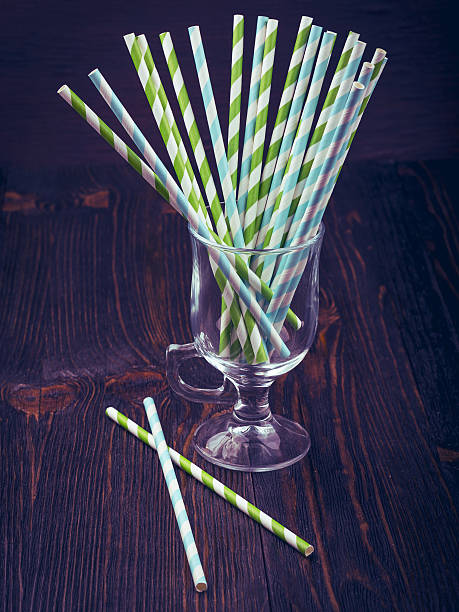 istock Striped straws for cocktails in a glass 521977526