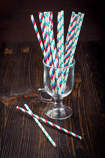 istock Striped straws for cocktails in a glass 521977734