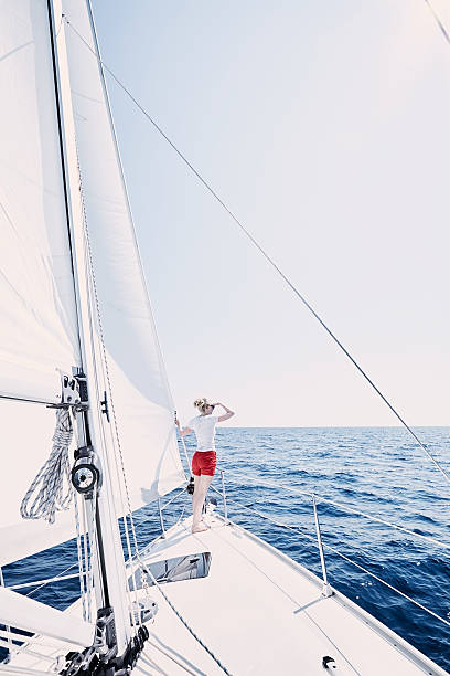 istock Girl on sailboat 521977862