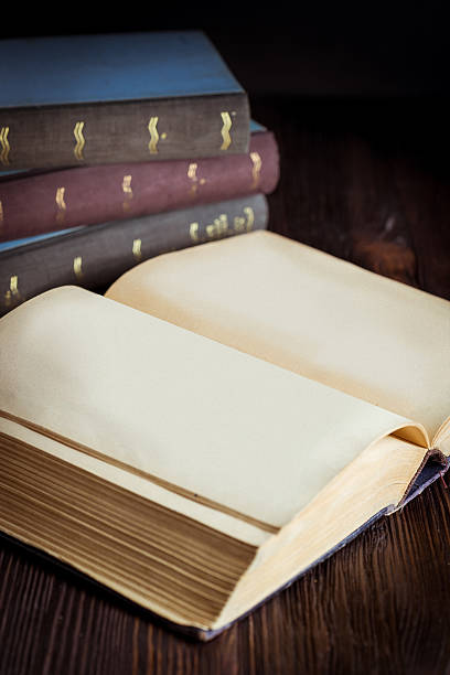 istock Open book in vintage light tone color 521977986